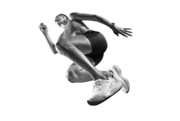 runner legs on dark asphalt background