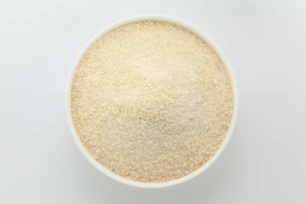 istock Organic Rice Flour (Oryza sativa) in a white ceramic bowl. Isolated on a grey background. Top View 2158374258