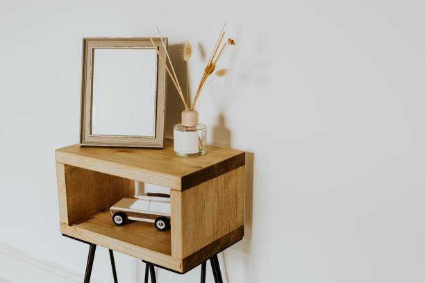 istock Empty wooden frame, bedside table in kids playroom, home decor 2158375122