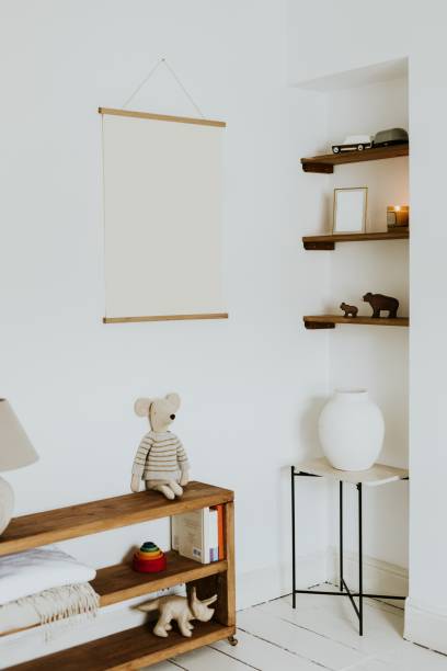 istock Empty white poster on wall in kids room 2158375249