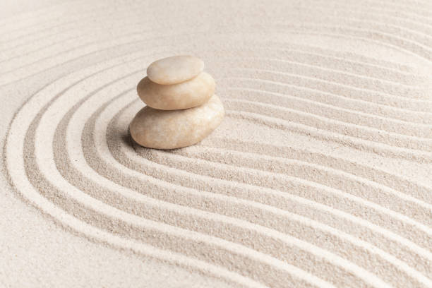 istock Stacked zen marble stones sand background in mindfulness concept 2158375660