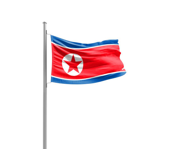 North Korea national flag waving isolated on white background with clipping path.