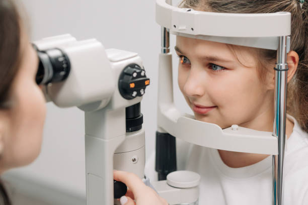 istock A little patient undergoes an eye test by a professional optometrist using modern diagnostic equipment in an ophthalmology clinic. 2158381137