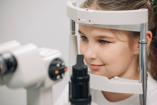istock A little patient undergoes an eye test by a professional optometrist using modern diagnostic equipment in an ophthalmology clinic. 2158381202