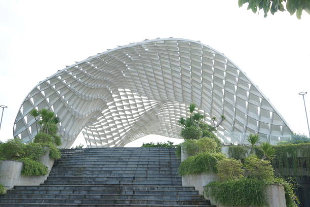 istock A large white structure with a curved roof and steps leading up to it 2158381663