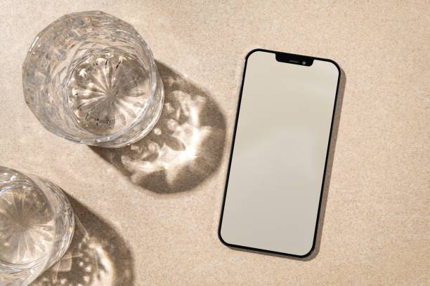 istock Phone with blank brown screen, aesthetic background 2158382083