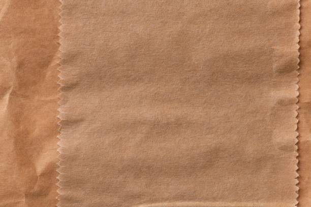 istock Brown background, wrinkled paper texture design 2158382656