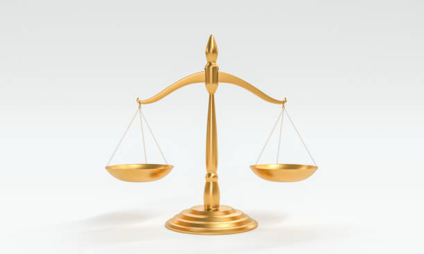 Golden balance scale on neutral background