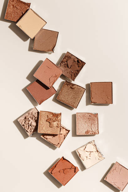 istock Beauty product neutral color eyeshadows for makeup, beige monochrome pattern on light background, flat lay with nude colors swatches eyeshade, cosmetic texture, beige color palette, top view pattern 2158386187