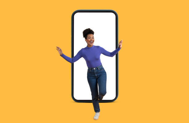 istock Woman Standing in Front of Cell Phone 2158386310