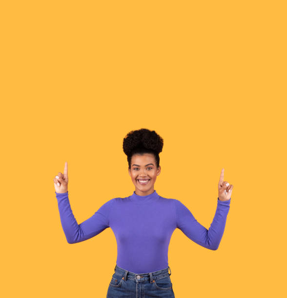 Woman Standing With Hands Up in the Air