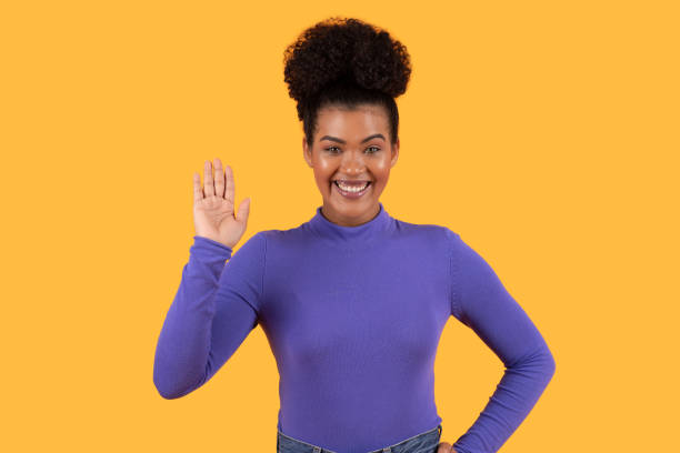 istock Woman in Purple Shirt Making Hand Gesture 2158386352