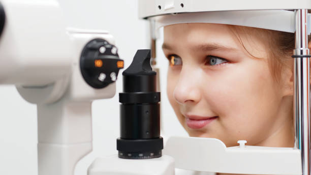 istock In a modern ophthalmology clinic, a small patient undergoes vision diagnostics. In the interior of a modern clinic. The concept of vision correction and diagnostics at an early age. 2158392993