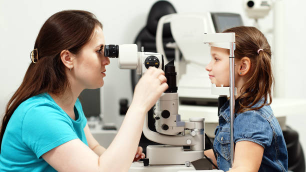 istock A little patient undergoes an eye test by a professional optometrist using modern diagnostic equipment in an ophthalmology clinic. 2158393525