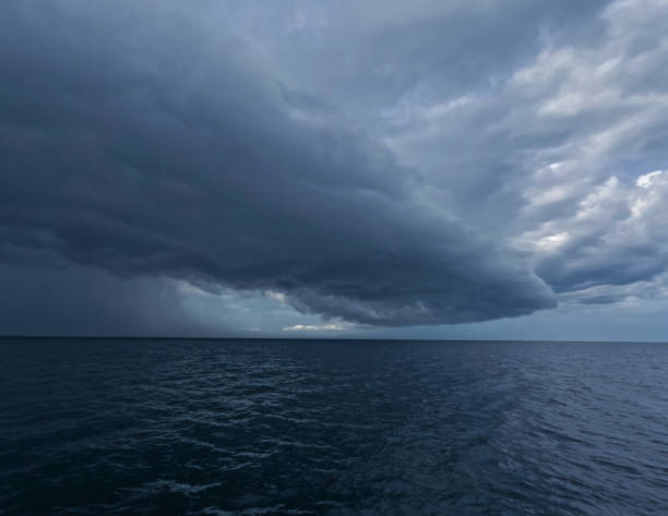 istock Dark with  Dramatic blue sky and dark as  Dramatic blue sea color and dark storm raining cloud background 2158394502