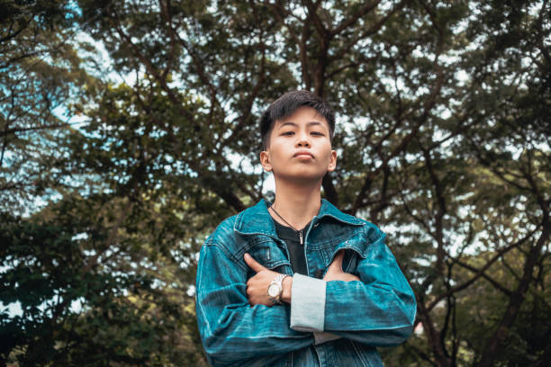 istock A young confident man showing his casual outfit. Thinking about his personal issues and self-esteem. 2158396022