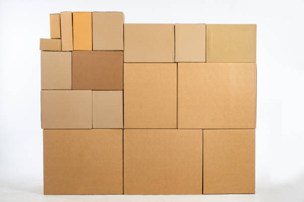 istock Boxes in the warehouse. Cardboard boxes for packaging an industrial mechanism. Warehouses. Packaging of finished products of the plant. Sale of packaging materials. 2158396971