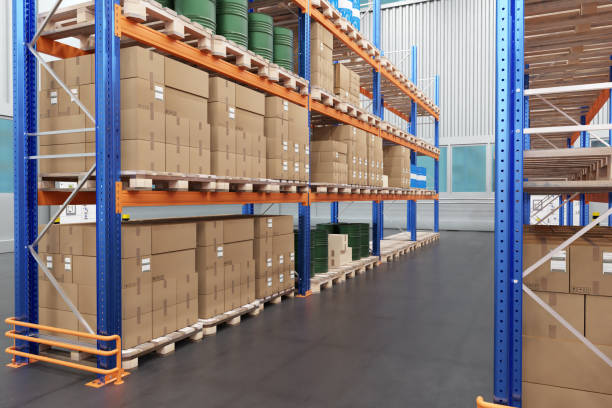 istock Shelving with boxes. Logistics warehouse without people. Shelves with boards and boxes. Racks with boxes on pallets. 2158397002