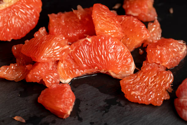 istock slices of peeled grapefruit close-up 2158397224