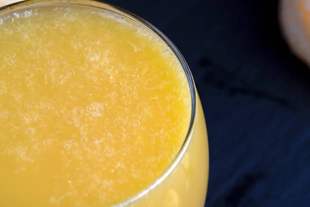 A red and orange swirled cocktail (could be a Mai Tai or a Tequila Sunrise or a Rum Runner or a Fuzzy Navel)