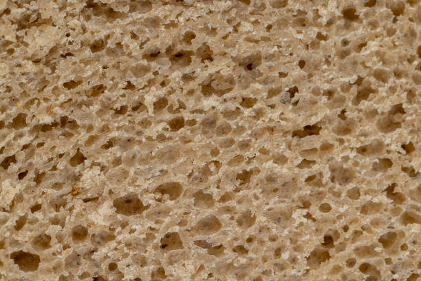 black square rye bread, close-up of a loaf of dark rye sour bread in the kitchen