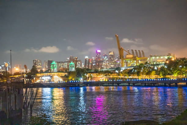 Cityscape night view from Sentosa Boardwalk in Singapore.