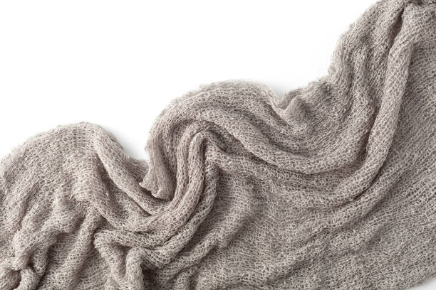 istock gray wrinkled cloth on white background 2158399174