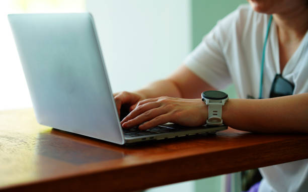 istock woman use laptop on table for relax 2158403074
