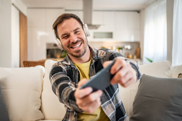 istock A man bets online during a football match. 2158403428