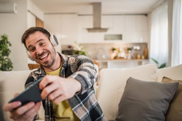 istock A man bets online during a football match. 2158403441