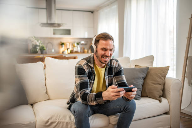 istock A man bets online during a football match. 2158403466