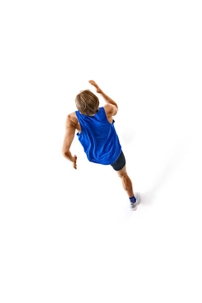 istock Young man in motion, runner showing athletic performance and skills isolated on white studio background. Isometric view. 2158403541