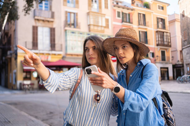 istock Two young friends are looking for accommodation in Palma de Mallorca 2158403888