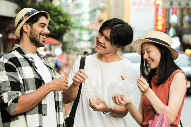 istock Multiracial Group Enjoy local food in Asia 2158406477