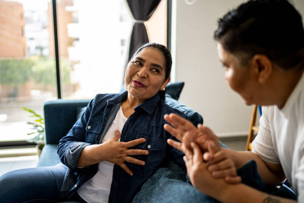 istock Lesbian couple talking at home 2158408402