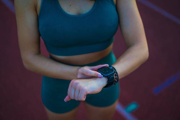 istock young woman is training on the running track 2158411343