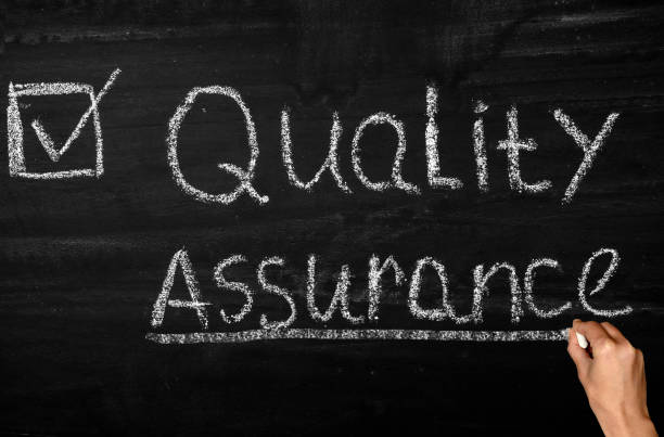 istock Quality assurance concept on chalkboard 2158416844