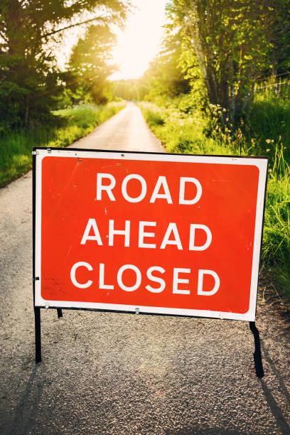 istock Road closed sign in UK 2158419119