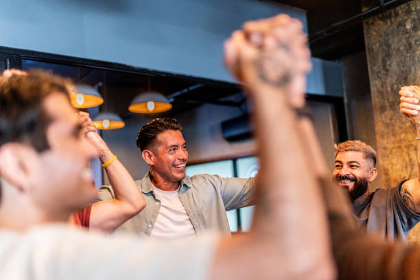 istock Men talking and celebrating during males group therapy 2158419228