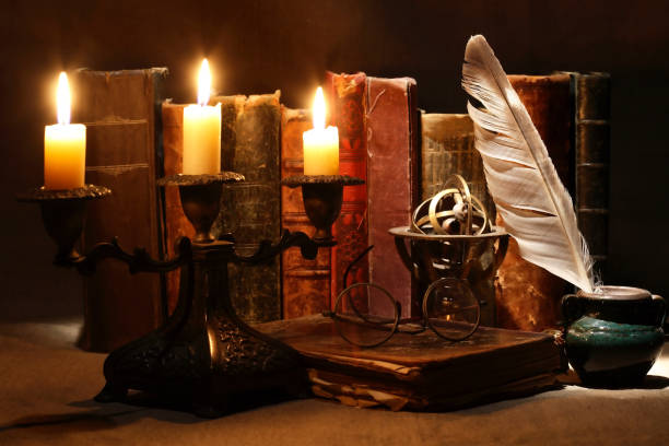 istock Old Books And Candles 2158421970
