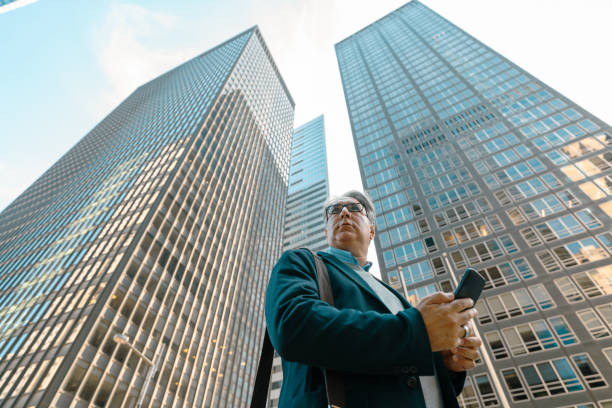 istock Man with technology in the city 2158429523