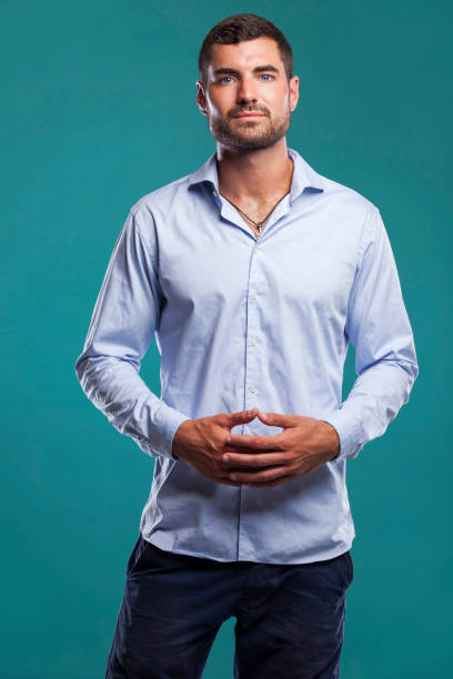 istock Stylish handsome business man posing in studio 2158429544