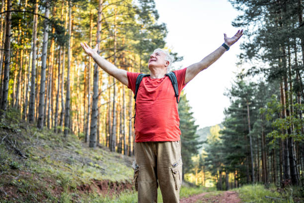 istock Happy senior man on hiking 2158429640