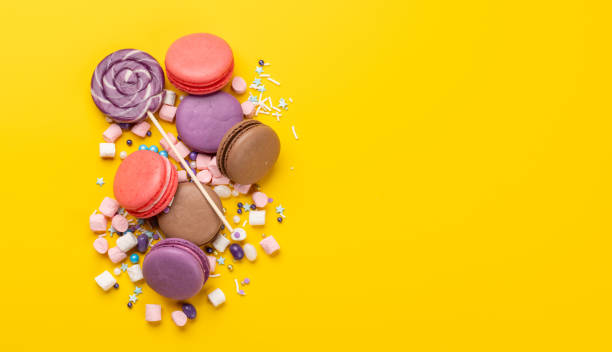 istock Various colorful candies, lollipops, and macaroons 2158429695