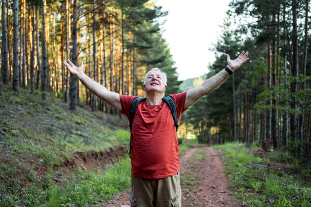 istock Happy senior man on hiking 2158429736