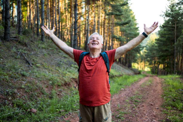 istock Happy senior man on hiking 2158429897