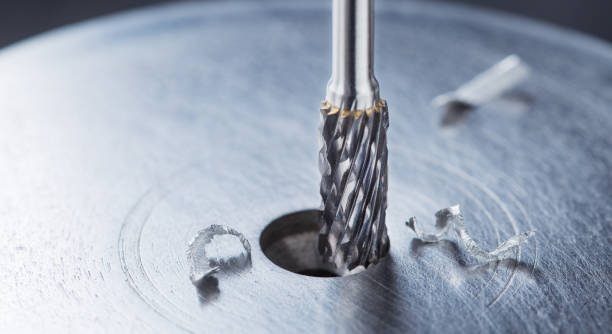istock Milling cutter make sink in hole in steel billet. Locksmith work. 2158430838