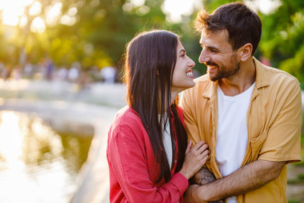 istock Couple gazing affectionately by the waterside. 2158431888
