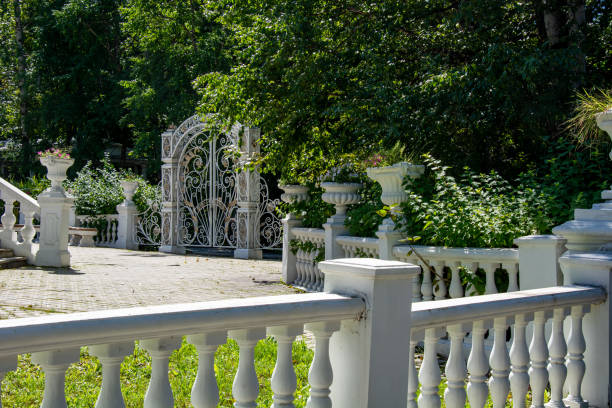 Moscow, Russia August 28, 2023 Park landscape. Stone-paved structures in the park and green trees with grass