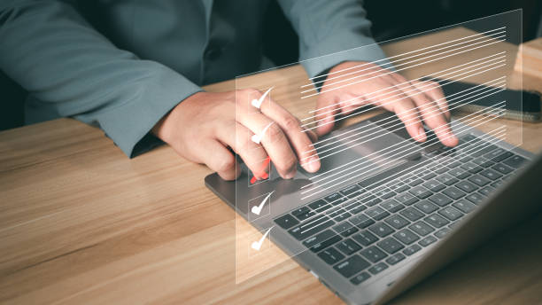 istock Business performance checklist, businessman using laptop doing online checklist survey, filling out digital form checklist, take an assessment, questionnaire, evaluation, online survey, online exam. 2158436873